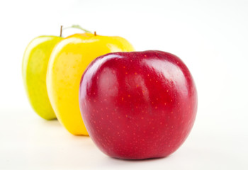 Green and red apple with leaves isolated on white