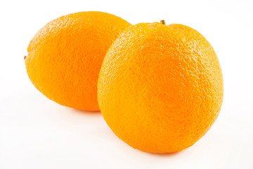 fresh oranges isolated on white background
