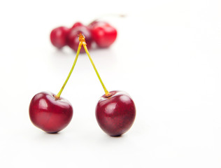 fresh isolated red cherries