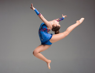 teenager doing gymnastics dance - obrazy, fototapety, plakaty