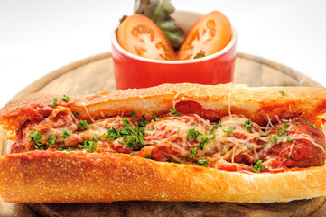 Fastfood - French baguette with meatballs