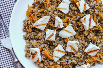 Buckwheat with carrot and  fried chopped adygei cheese