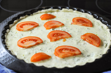 Preparation of pie with cottage cheese and feta and tomatoes
