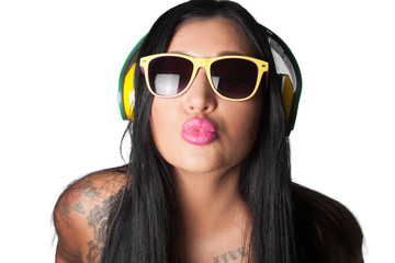 Naklejka premium Young heavily tattooed woman Listening to colorful DJ Style Head