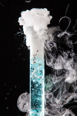 Chemical reaction of blue liquid in raduated cylinder