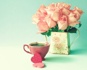 Pink roses, hand-painted wood hearts and coffee cup