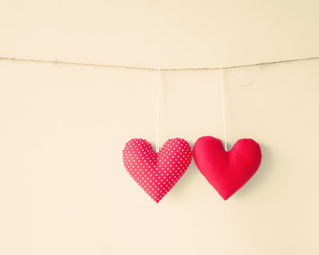 Vintage cotton hearts hanging from a line