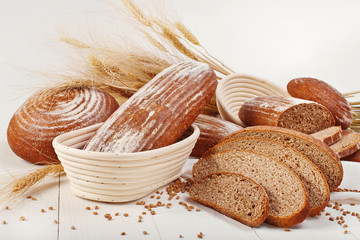 set of fresh baked traditional bread and wheat
