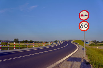 Road with traffic signs in Poland.