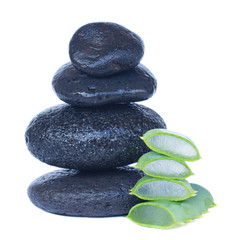 Obraz na płótnie Canvas massage stones with aloe vera