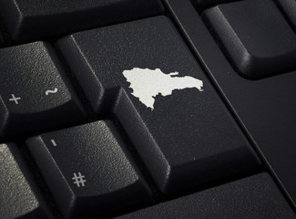 Keyboard with return key in the shape of Dominican Republic.(ser