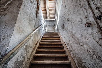 Wooden stairs in an abandoned house