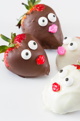 strawberries with faces