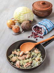 Cooking traditional Ukrainian beet soup 