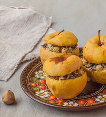 Baked apples with raisin, poppy seeds, rice and honey
