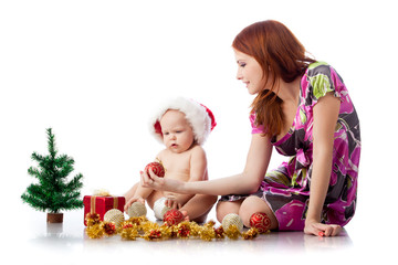 Obraz na płótnie Canvas Baby and mum with Christmas decoration