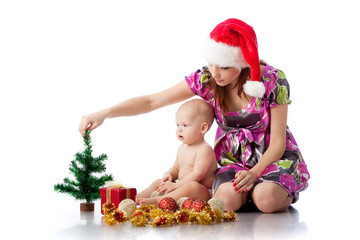 Obraz na płótnie Canvas Baby and mum with Christmas decoration