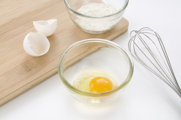Cooking Ingredients, Egg, Flour and Whisk