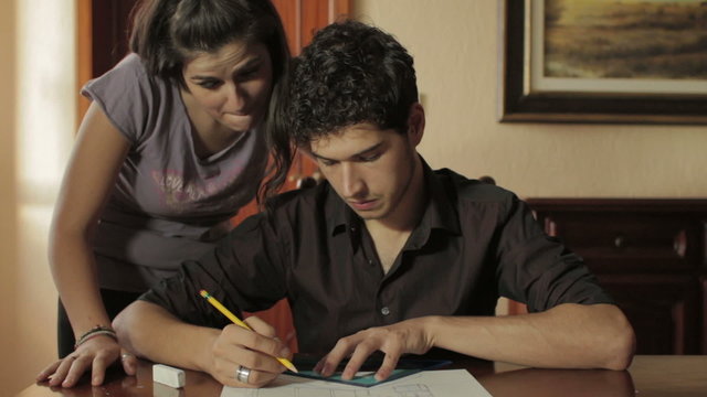 students have fun doing  a architectural project - lover - exam - laugh - kiss