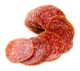 Obraz premium Slices of salami isolated on white
