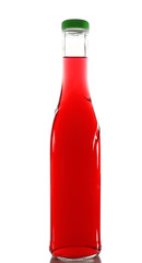 Colorful alcoholic beverage in glass bottle isolated on white