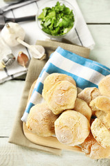 Fresh homemade bread buns from yeast dough with fresh garlic