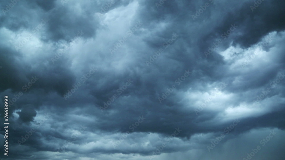 Wall mural lightning during a thunderstorm. storm clouds are moving fast on