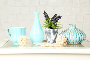Interior with decorative vases and plant