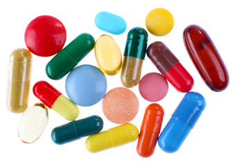 Different colorful pills isolated on white background