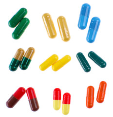 Different colorful pills isolated on white background