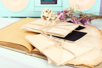 Vintage memories with dry flowers on wooden background