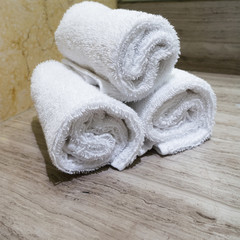 row of towels in the bathroom