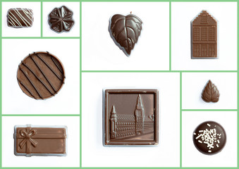 Différents bonbons en chocolat sur fond blanc