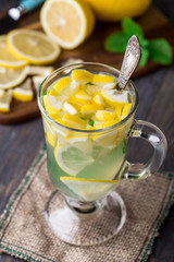 Glass with mint and lemon tea
