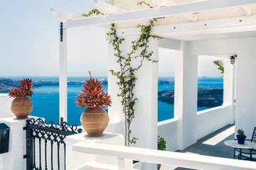 Papier Peint photo Lavable Santorin Greek house with terrace and sea view