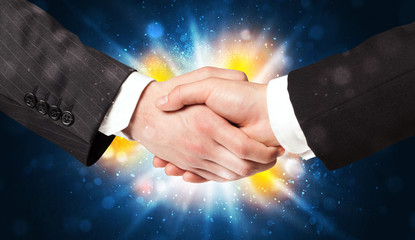 Two business men shaking hands