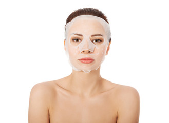 Beautiful woman with collagen mask.