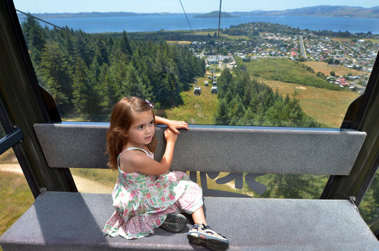 Young girl travel on Skyline Gondola