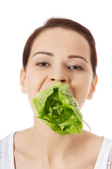 Smiling woman eating salat