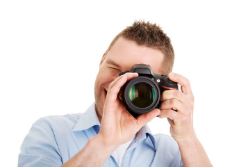 Obraz premium Man photographer with DSLR