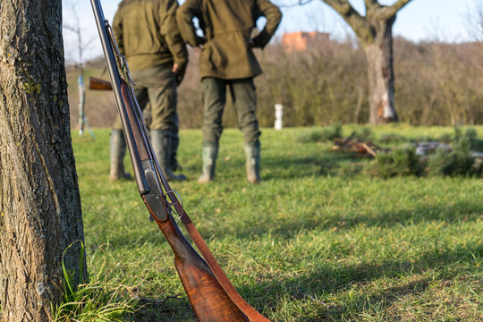 Rifle in front hunters.