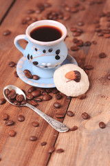 Almond cookie with cup of coffee