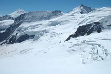 Fototapeta na wymiar Crevasses, ice and snow nearby Jungfraujoch in Switzerland
