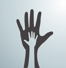 Fototapeta na wymiar Silueta de mano sobre mano en señal de ayuda. Caridad.