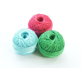 thread balls on white background