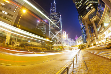 Fototapeta na wymiar Traffic in the financial district of Hong Kong at night