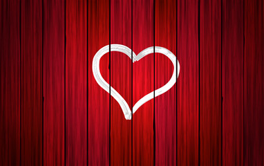 Corazón pintado con pintura blanca en una pared de madera roja.