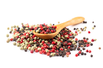 Pepper seasoning mix in wooden spoon