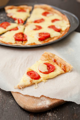 Italian pizza with mozzarella cheese and tomatoes, Margarita