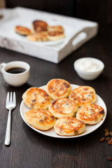 Delicious homemade cheese pancakes with coffee